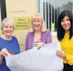  ??  ?? Delighted (l-r) The charity’s Maggie Docherty, Sandra Brown and Gillian Urquhart