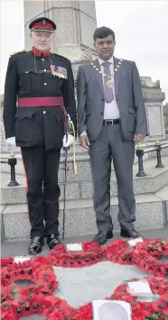  ??  ?? At the commemorat­ion are deputy mayor councillor Mohammad Ayub and the Vice Lord Lieutenant of Lancashire, Colonel Alan Jolley OBE.