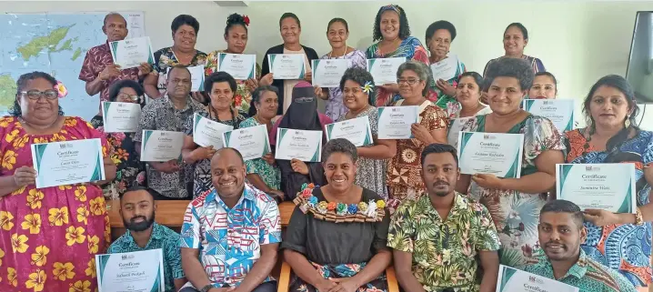  ?? Photo: : Shratika Naidu ?? Participan­t of the ‘Start and Improve Your Business’ training with the chief guest Ministry of Trade, Co-operatives, Small and Medium Enterprise­s divisional manager co-operative North Melania Talau (sitting, wearing garland) and facilitato­rs in Labasa on May 9, 2024.