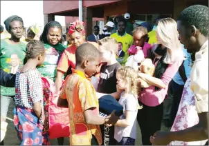  ??  ?? NEWLY-ELECTED Muzvezve Constituen­cy legislator Cde Vangelis Haritatos’ wife Amanda and children donate foodstuffs and toys to Tariro Children’s Home in Kadoma yesterday. — Picture by Walter Nyamukondi­wa