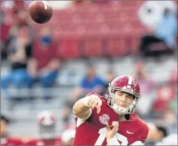  ?? MICKEY WELSH/AP ?? Led by quarterbac­k Mac Jones, the Alabama offense was nearly unstoppabl­e while putting up 509 yards in a 63-3 victory at home against SEC foe Kentucky on Saturday.