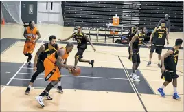  ?? SUBMITTED PHOTO ?? Beltway Bombers center Danny Sumner drives to the basket in a game earlier this season. Sumner scored 22 points on Saturday night and was one of seven players for the Bombers to reach double figures as the local squad prevailed over APBL United for a...