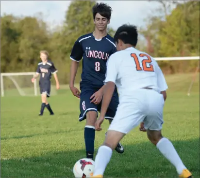  ?? File photo by Jerry Silberman / risportsph­oto.com ?? On the soccer field, Lincoln senior Matt Mardo (8) is a team captain and a talented midfielder who can also play defense. Off the field, Mardo is one of the smartest kids in his class, as the Lion has been accepted into Harvard, Brown and Johns Hopkins.