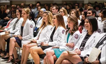  ?? COURTESY ACC ?? Austin Community College nursing students at the Eastview Campus mark completion of their two-year associate degree program on April 11. ACC hopes to offer a nursing bachelor’s degree if Senate Bill 2118 becomes law.