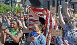  ?? Gene J. Puskar/Associated Press ?? People participat­e in a Black Lives Matter rally Sunday on Mount Washington.