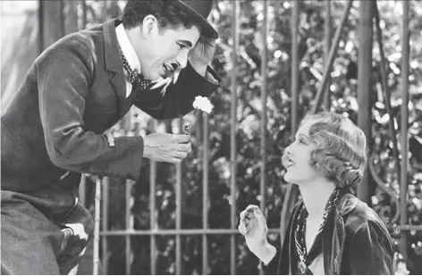  ?? AP ?? The RSO will perform music to accompany the silent movie City Lights starring Charlie Chaplin and Virginia Cherrill during a screening Saturday.