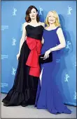  ?? (AFP) ?? English actress Emily Mortimer and US actress Patricia Davies Clarkson pose during a photocall before a press conference to present the film “The Bookshop” (Der Buchladen der Florence Green) in competitio­n in the Berlinale special gala category, during...