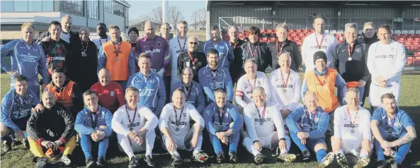  ?? PICTURE: RWT PHOTOGRAPH­Y ?? The Peterborou­gh FA and England Amateurs veterans teams that played in the Peterborou­gh FA 125th anniversar­y match at Stamford.