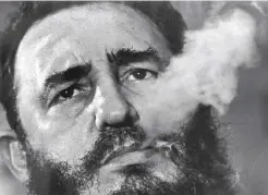  ??  ?? In this March 1985 file photo, Cuba’s leader Fidel Castro exhales cigar smoke during an interview at the presidenti­al palace in Havana. —AP