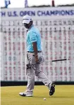  ?? DAVID J. PHILLIP/ASSOCIATED PRESS ?? Brain Harman, one of the four players tied for the 36-hole lead at the U.S. Open, looks over a putt on the 18th hole Friday.