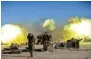  ?? - Reuters ?? MAKING INROADS: Popular Mobilizati­on Forces (PMF) fire against IS militants on the outskirts of Tal Afar, Iraq, on on Sunday.