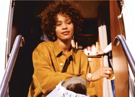  ??  ?? An image of the young Whitney Houston as seen in the documentar­y “Whitney.” | ESTATE OF WHITNEY E. HOUSTON