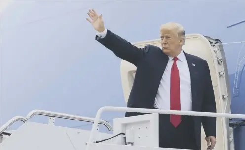  ?? PICTURE: MANUEL BALCE CENETA/AP ?? 0 President Donald Trump boards Air Force One yesterday for a trip to Houston