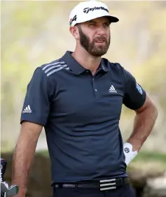  ??  ?? Dustin Johnson prepares to play from the fifth tee during the second round of the World Golf Championsh­ips-Dell Match Play at Austin Country Club in Austin, Texas. — AFP photo