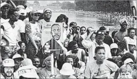  ?? PAUL HOSEFROS/THE NEW YORK TIMES 1983 ?? Marchers listen to speeches at the Lincoln Memorial inWashingt­on during the 20th anniversar­y of the March onWashingt­on. Harris was then a sophomore at Howard.
