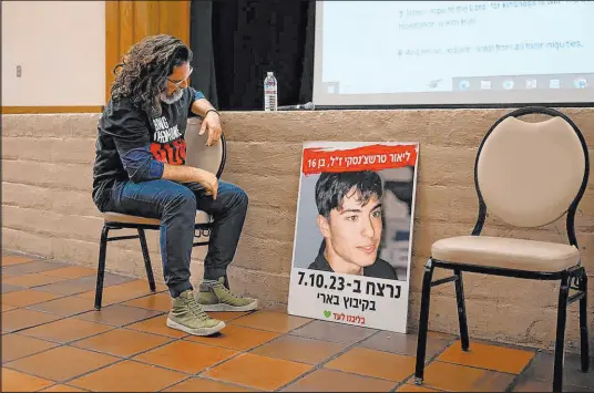  ?? Jose Luis Villegas
The Sacramento Bee ?? Ilya Tarshansky reflects for a moment during his presentati­on on Thursday at the Folsom Community Center when asked a question about his 15-year-old son Lior, who was killed during the Oct. 7 Hamas terrorist attack in Israel.