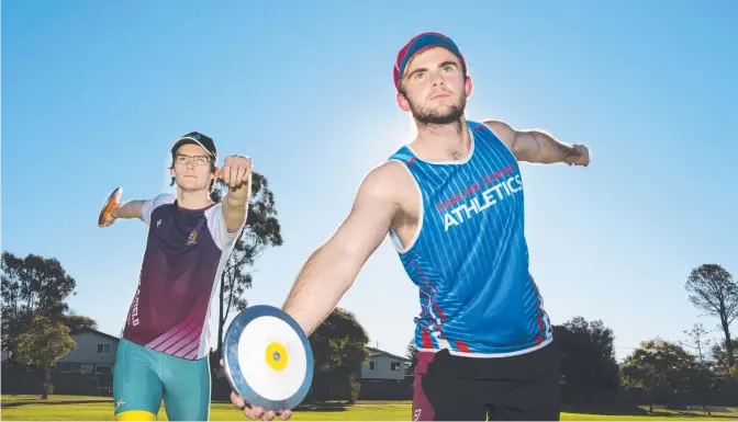  ?? Picture: Nev Madsen ?? ONLINE FUN: Darling Downs Athletics Club discus throwers Mason Hughes (left) and Will Gilmore have joined an online competitio­n to keep up their spirits.