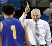  ?? Arkansas Democrat-Gazette/MITCHELL PE MASILUN ?? John Hutchcraft compiled a record of 2,013-617 in 40 seasons as the boys and girls basketball coach at Guy-Perkins High School, winning 11 state championsh­ips, the final one a boys title this season.