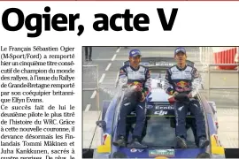  ?? (Photo AFP) ?? Ingrassia (co-pilote) et Ogier ont savouré leur mondial de rang avec du champagne. titre