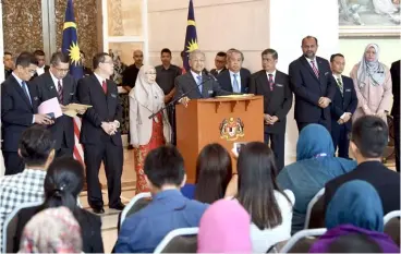  ??  ?? Dr Mahathir during the press conference after he announced several important decisions made in a Cabinet meeting. — Bernama photo