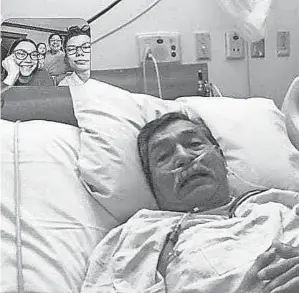  ??  ?? Johnny Lara Gonzales FaceTimed with family members from his hospital room in Fayettevil­le, Ark., after he was diagnosed with COVID- 19. His family wonders if he got it while getting a haircut. He died Oct. 10 at age 82.