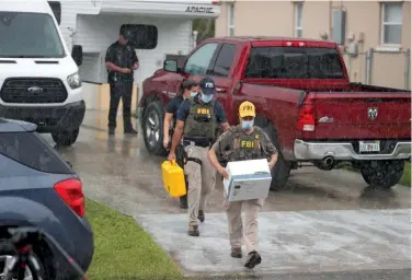  ?? ?? SEEKING ANSWERS The FBI searched the home of Brian Laundrie while investigat­ing the death of Laundrie’s missing girlfriend, Gabby Petito, in 2021.