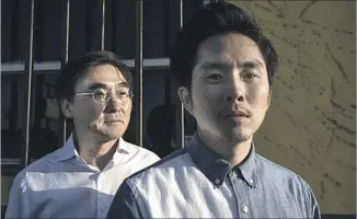  ?? Robert Gauthier Los Angeles Times ?? JUSTIN CHON, right, and dad Sang Chon at a site where Justin filmed “Gook,” about the riots.