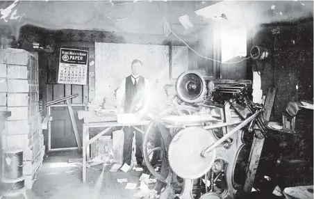  ??  ?? A man stands in an egg carton factory that Joseph Coyle rented from the Brown Print Shop in Los Angeles in 1924.