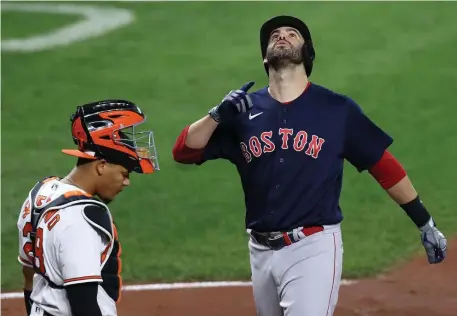  ?? GETTY IMAGES ?? BIG SHOT: J.D. Martinez celebrates in front of catcher Pedro Severino after hitting a second-inning solo home run against the Orioles in Baltimore on Wednesday.
