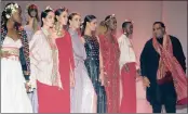  ?? PICTURE: FAKIR HASSEN ?? Designer Gavin Rajah takes a bow at Sunday’s banquet as models show off the kadi garments he created.