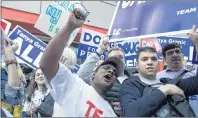  ?? CP PHOTO ?? People identifyin­g as Ontario PC supporters gather ahead of the first televised leaders debate in Toronto on Monday.