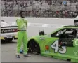  ?? CHARLES KRUPA ?? Driver Bubba Wallace stands during the national anthem before a NASCAR Cup Series auto race, Sunday, Aug. 2, 2020, at the New Hampshire Motor Speedway in Loudon, N.H.