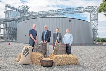  ?? ?? DRAM-ATIC: From left, Charles Tozer, Yvan Schaepman and Peter Nallen, all of Boortmalt, with Moray MP Douglas Ross, second from right, at the Buckie kiln.