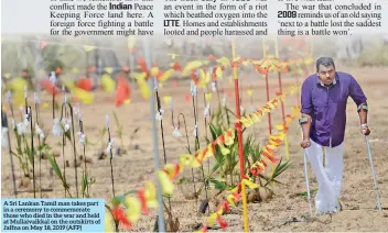  ??  ?? A Sri Lankan Tamil man takes part in a ceremony to commemorat­e those who died in the war and held at Mullaivaik­kal on the outskirts of Jaffna on May 18, 2019 (AFP)