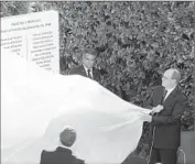  ?? Claude Paris Associated Press ?? PRINCE Albert II, right, unveils a monument to deported Jews and speaks of the principali­ty’s role.