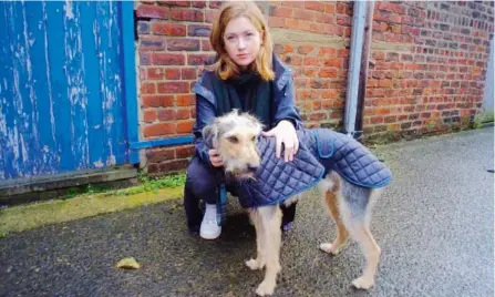  ?? HARPERCOLL­INS CANADA LTD. ?? Fiona Mozley and her dog — “a small lurcher” — were both excited by news of her Man Booker prize nomination.