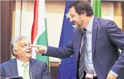  ?? LUCA BRUNO THE ASSOCIATED PRESS ?? Matteo Salvini, right, Italy's interior minister and deputy premier, meets a fellow hardliner, Hungarian Prime Minister Viktor Orban, in Milan.