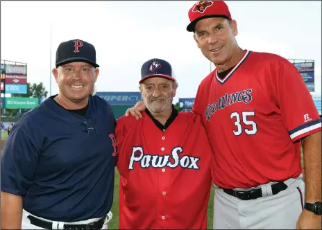  ?? Photo by Louriann Mardo-Zayat / lmzartwork­s.com ?? PawSox manager Kevin Boles, left, poses with Central Falls native Roland Hemond, middle, and Rochester skipper Joel Skinner prior to last Friday's game at McCoy Stadium. When Hemond was the general manager of the Chicago White Sox, he offered Boles' father John a job to manage the organizati­on's Gulf Coast League affiliate.