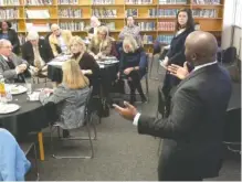  ?? STAFF PHOTO BY TIM BARBER ?? Superinten­dent Bryan Johnson speaks to local state legislativ­e delegation members at Orchard Knob Middle School on Tuesday. District 6 school board member Jenny Hill, top right, listens.