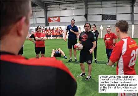  ?? JONATHAN MYERS ?? Gwilym Lewis, who is not only the chairman of the club but also coaches the team and even plays, leading a coaching session at The Barn at Parc y Scarlets in 2018.