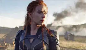  ?? DISNEY VIA AP MARVEL STUDIOS/ ?? This image released by Disney/Marvel Studios’ shows Scarlett Johansson in a scene from “Black Widow.” Disney announced the film release date as July 9.