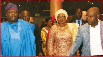  ??  ?? Dada at an occasion with Governor, Akinwunmi Ambode and wife