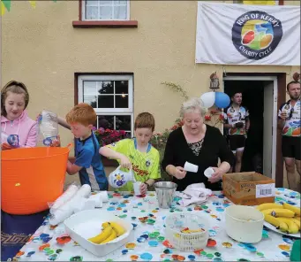  ??  ?? Betty Casey, opens her house at Kelly’s Cross, outside Sneem every year, for cyclists in the 35th Annual Ring of Kerry Charity Cycle, helping out Ireland’s Biggest Charity event, were relatives, Catriona, Michael and Padraig Casey. The 175 km cycle has...