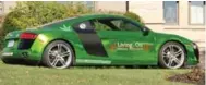  ?? JESSE MCLEAN/TORONTO STAR ?? Durham police Const. Phil Edgar’s Audi R8 is emblazoned with the dispensary company name, Living On Inc.