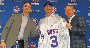  ?? GETTY IMAGES ?? Epstein (left) and GM Jed Hoyer flank new Cubs manager David Ross in October 2019.