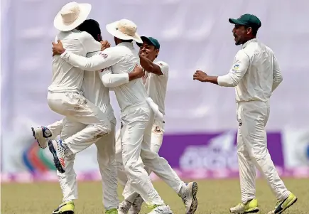  ?? PHOTO: GETTY IMAGES ?? Shakib Al Hasan celebrates taking another Australian wicket during Bangladesh’s dramatic charge to victory in the first test.