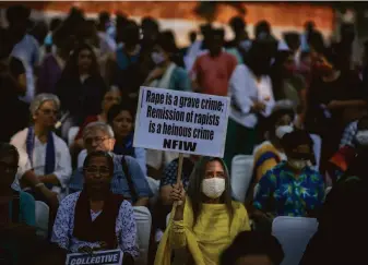  ?? Altaf Qadri / Associated Press ?? Protesters in New Delhi rally against the release of 11 men who had been jailed for life for gangraping a Muslim woman. The protesters demanded that Gujarat state rescind the decision.