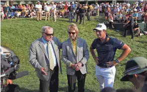  ?? CAIRNS/COLUMBUS DISPATCH ADAM ?? Should Viktor Hovland, right and standing with Barbara and Jack Nicklaus, win the Memorial Tournament again in 2024, his payout will be even higher.