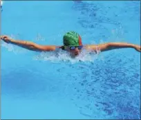  ?? PHOTO BY VIKKI CROWLEY ?? Vivienne Lamb won three events for the Zena Sundevils at the DUSO championsh­ip swim meet.