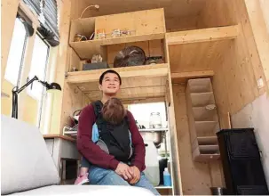  ?? — Photos: AFP ?? Le-Mentzel in one of his tiny homes. The architect is hoping the small spaces will help address the issue of refugee housing.